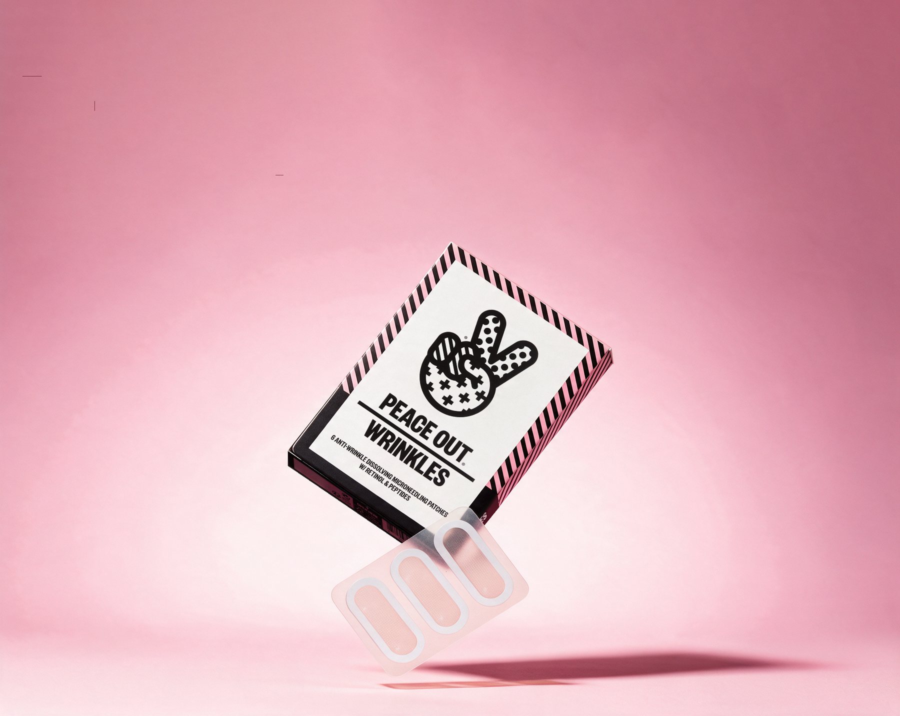 Peace Out Wrinkles box floating over pink with a patch sheet